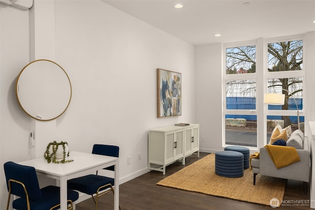 sitting room featuring dark wood finished floors, recessed lighting, and baseboards