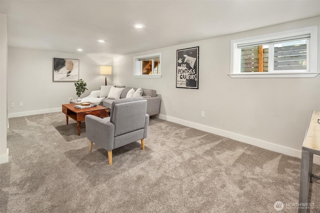 living area with carpet flooring, recessed lighting, and baseboards