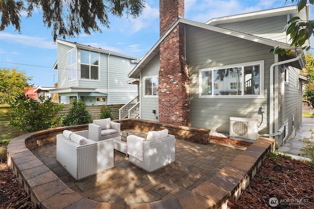 back of property featuring ac unit, an outdoor living space, a patio, fence, and a chimney