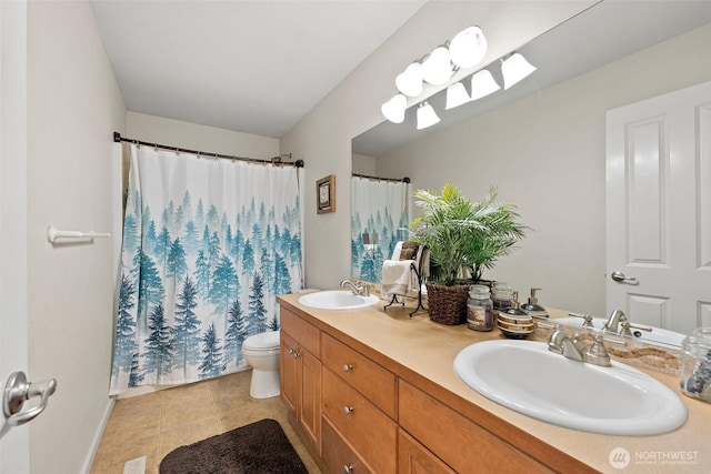 full bath featuring a sink, toilet, double vanity, and tile patterned floors