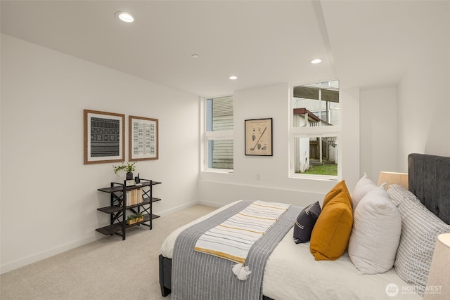 carpeted bedroom with recessed lighting and baseboards