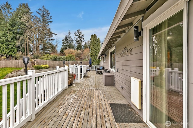 wooden deck featuring fence