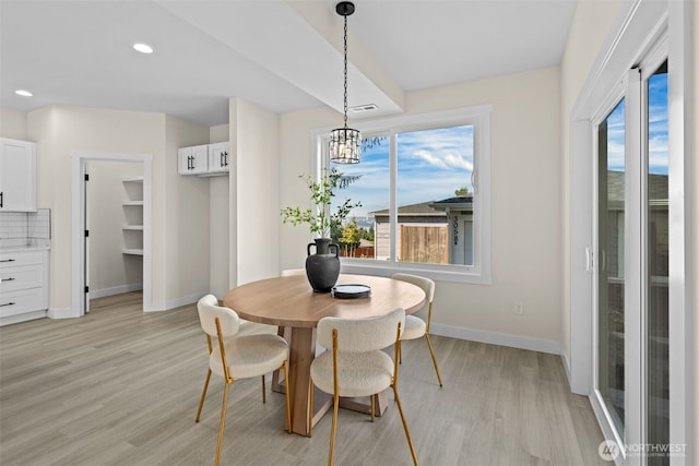 dining area with light wood-type flooring, visible vents, a notable chandelier, recessed lighting, and baseboards