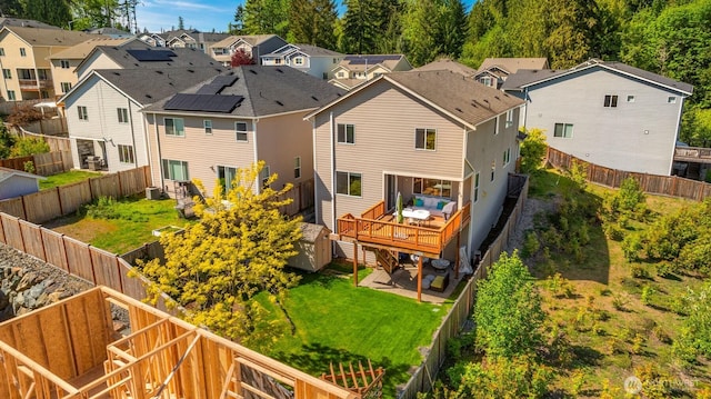 216 178th St SE, Bothell, WA 98012 - exterior space featuring a fenced backyard, a deck, and a residential view