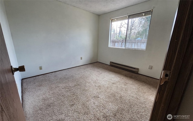 unfurnished room with a textured ceiling, carpet floors, and a baseboard radiator