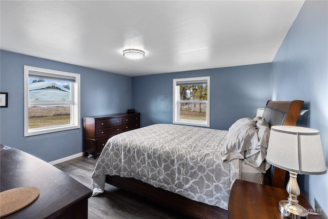 14530 Rutherford Rd, Yakima, WA 98903 - bedroom with wood finished floors, multiple windows, and baseboards