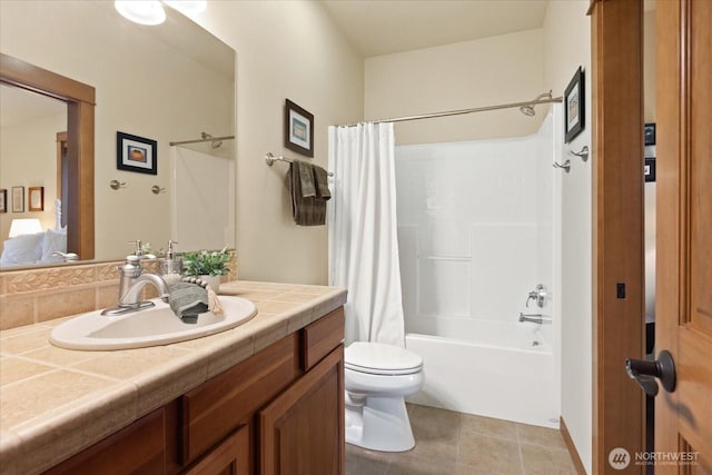 bathroom with tile patterned floors, vanity, toilet, and shower / tub combo with curtain