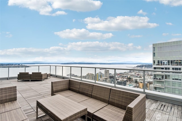 588 Bell St Unit 1603S, Seattle, WA 98121 - balcony featuring a water view and an outdoor living space
