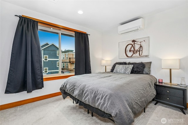 carpeted bedroom with a wall mounted air conditioner, baseboards, and recessed lighting