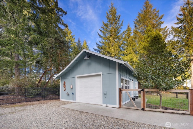 garage featuring fence