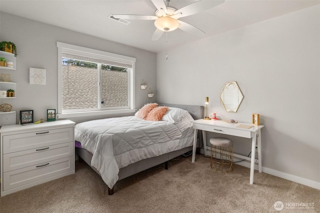 bedroom featuring ceiling fan, baseboards, visible vents, and light carpet