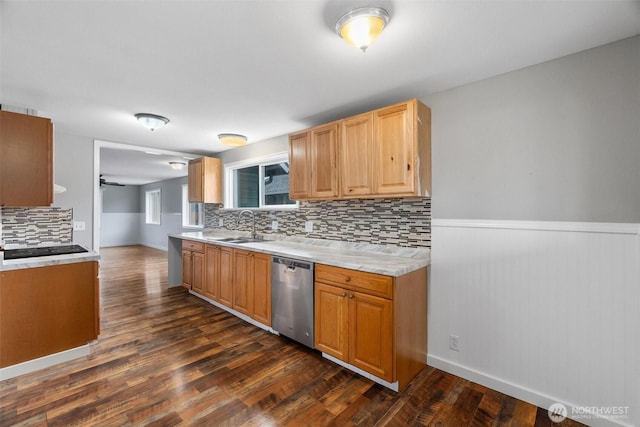 kitchen featuring a sink, light countertops, decorative backsplash, dishwasher, and dark wood-style flooring