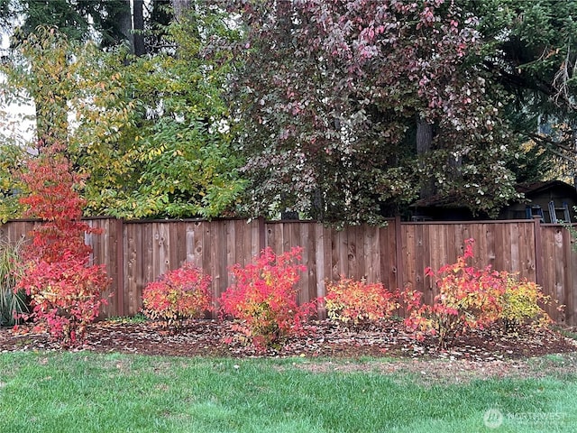 view of yard with fence