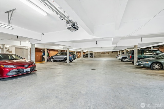 parking deck featuring a garage door opener