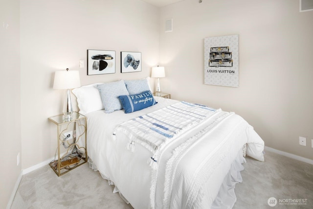 bedroom with carpet flooring, visible vents, and baseboards