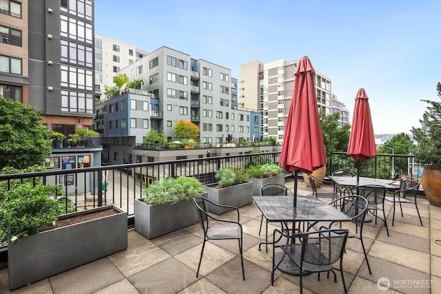 balcony featuring outdoor dining area