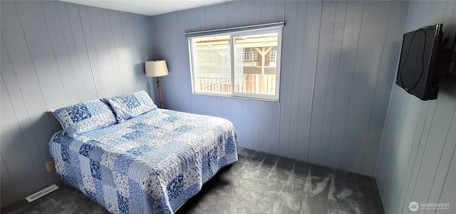 carpeted bedroom with visible vents