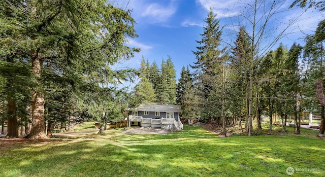 view of yard featuring a deck