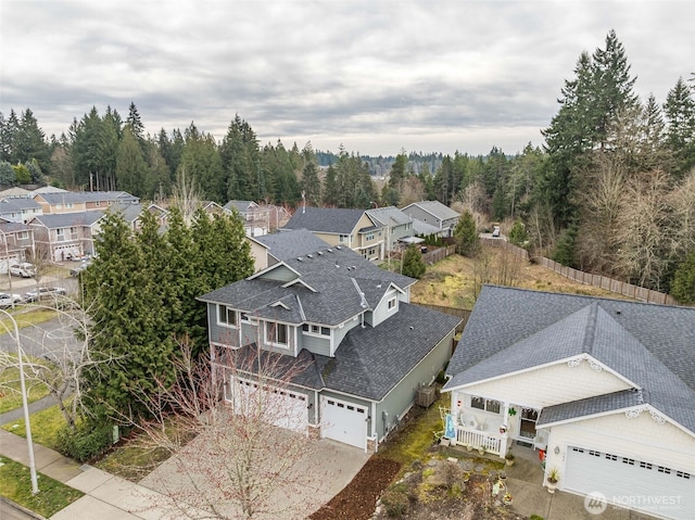 aerial view with a view of trees and a residential view