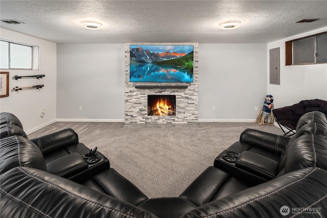 living room featuring electric panel, visible vents, and carpet