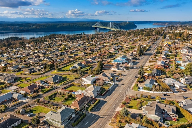 aerial view with a water view and a residential view