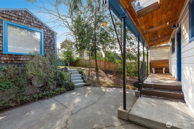 view of patio / terrace featuring fence