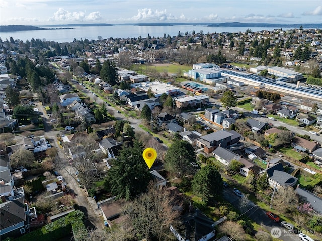 drone / aerial view with a water view