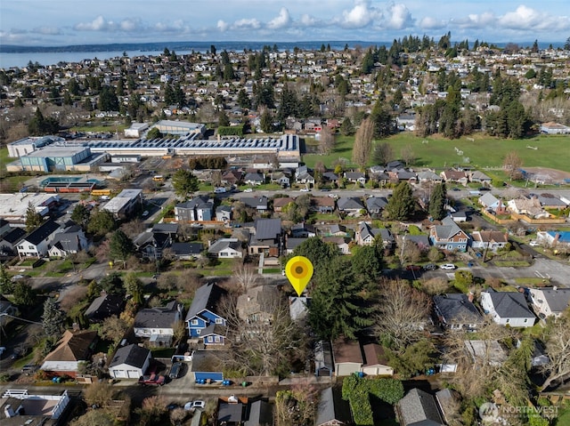 aerial view with a residential view and a water view