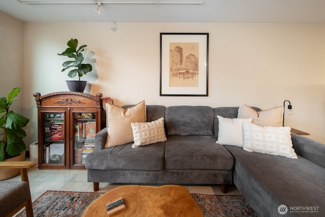 living room with tile patterned flooring