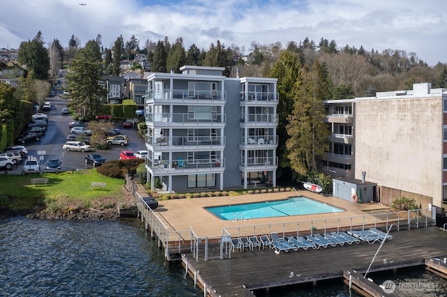 community pool with a water view