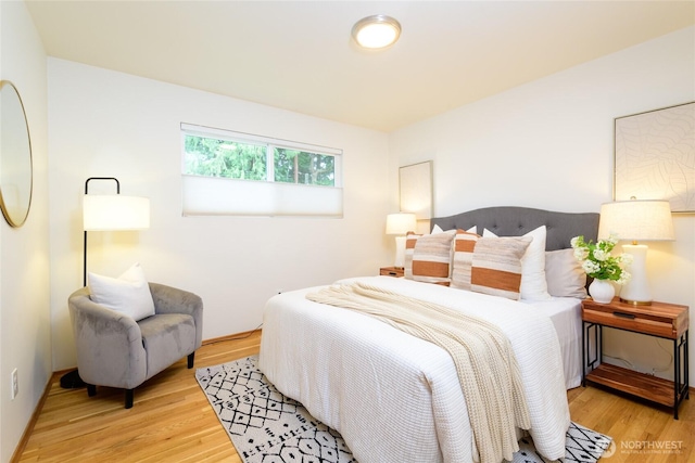 bedroom with wood finished floors