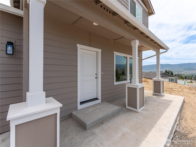 859 N Lyle Ave, East Wenatchee, WA 98802 - doorway to property featuring a mountain view and a patio