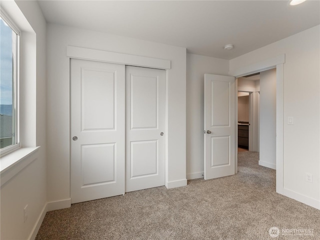 859 N Lyle Ave, East Wenatchee, WA 98802 - unfurnished bedroom featuring carpet flooring and a closet