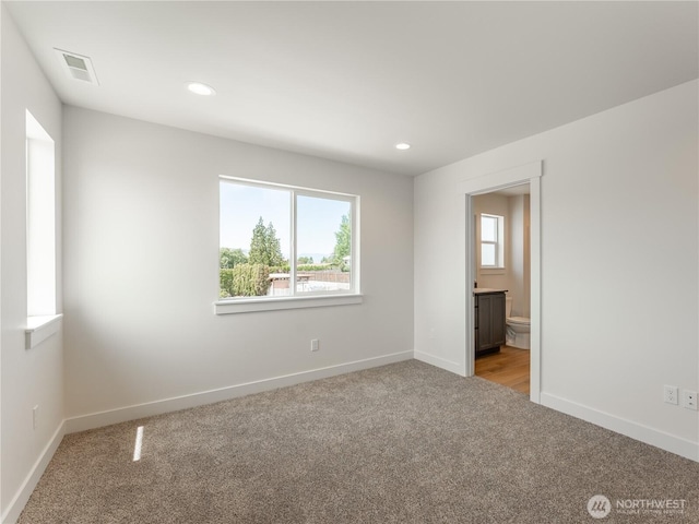 859 N Lyle Ave, East Wenatchee, WA 98802 - empty room with light colored carpet and recessed lighting