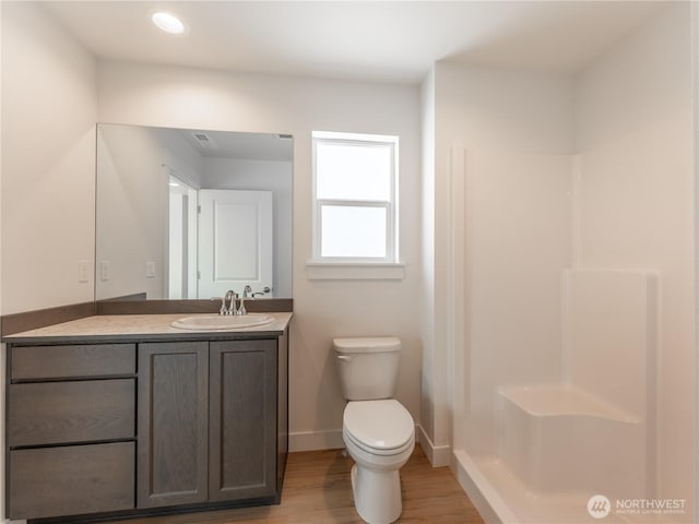 859 N Lyle Ave, East Wenatchee, WA 98802 - bathroom featuring wood finished floors, vanity, and a shower