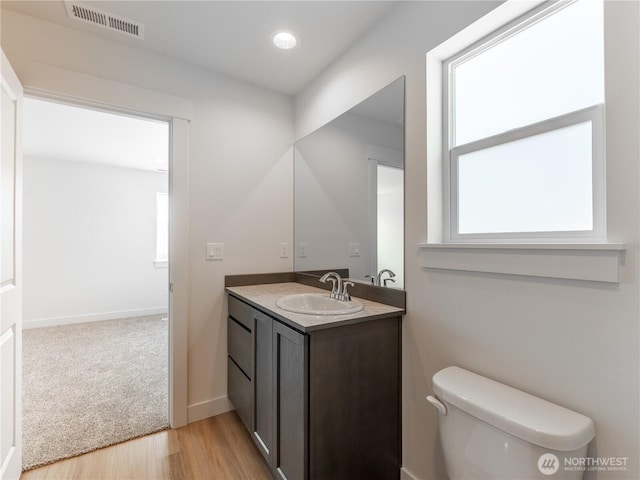 859 N Lyle Ave, East Wenatchee, WA 98802 - bathroom featuring vanity and wood finished floors