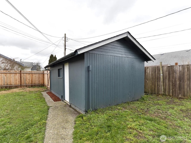 view of outbuilding featuring an outbuilding and a fenced backyard