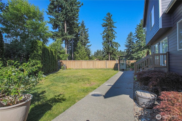 view of yard with fence