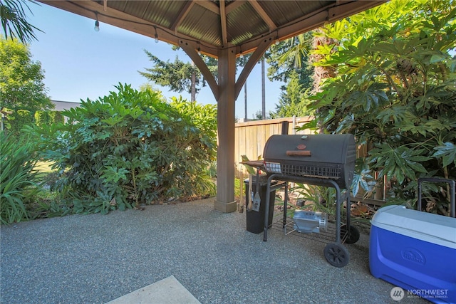 view of patio with a gazebo and area for grilling