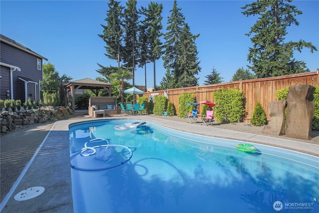 view of pool with a gazebo, a fenced in pool, and a fenced backyard