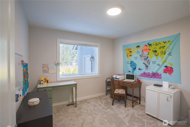 office space with light colored carpet and baseboards