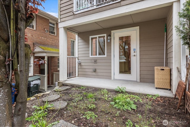 property entrance with a patio