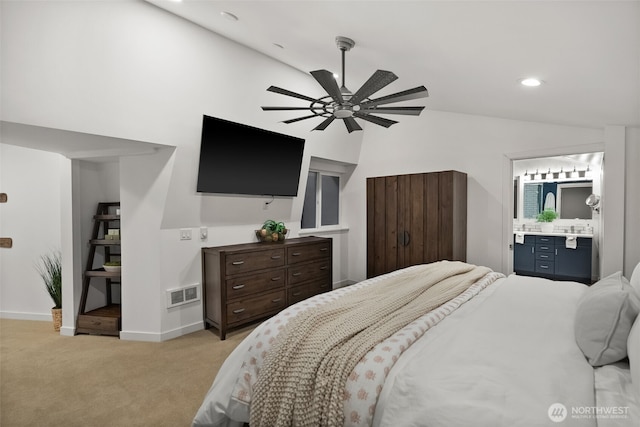 bedroom featuring visible vents, light carpet, recessed lighting, baseboards, and vaulted ceiling