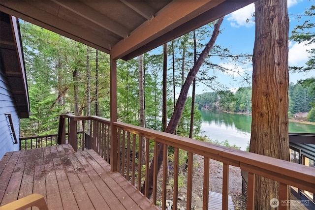 deck featuring a water view