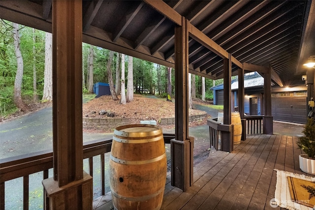 deck featuring an outdoor structure