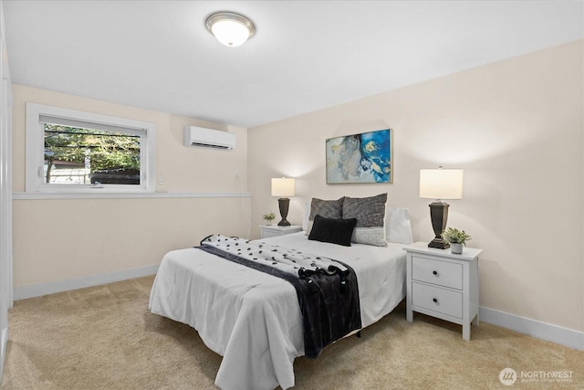 bedroom featuring a wall mounted AC, baseboards, and carpet floors