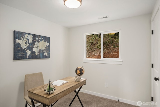 home office with visible vents, carpet floors, and baseboards