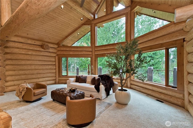 living room featuring visible vents, beamed ceiling, carpet floors, wooden ceiling, and high vaulted ceiling