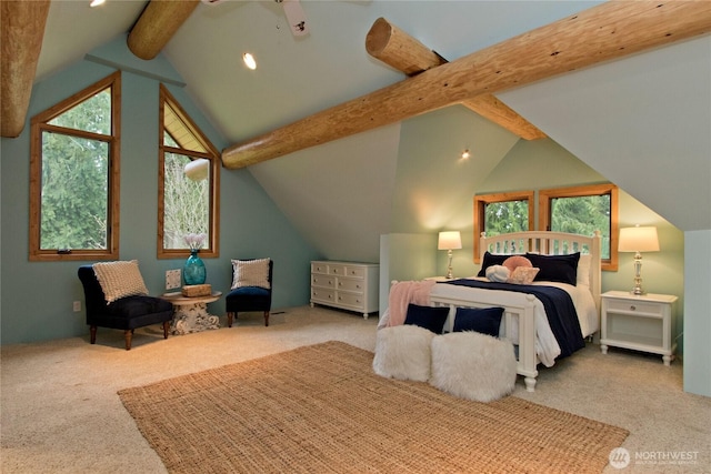 carpeted bedroom featuring lofted ceiling with beams and multiple windows