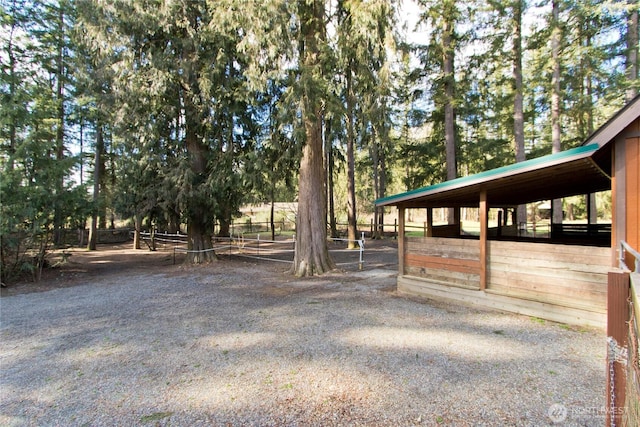 exterior space featuring an outbuilding and an exterior structure